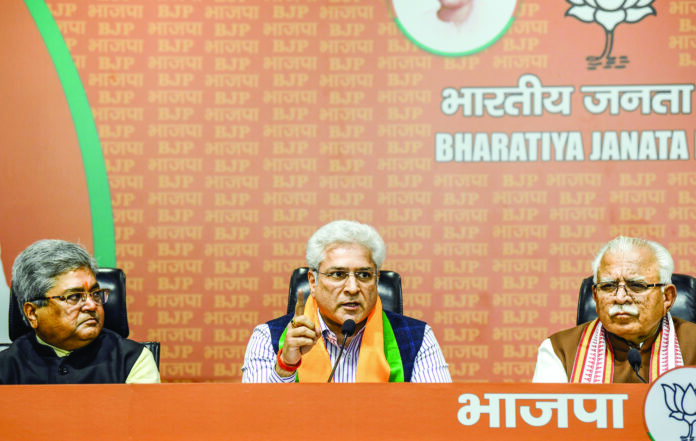 Former Delhi Transport Minister and Aam Aadmi Party (AAP) leader Kailash Gahlot addresses the media on joining Bharatiya Janta Party (BJP), at BJP HQ in New Delhi. Union Minister Manohar Lal Khattar also present. (ANI)
