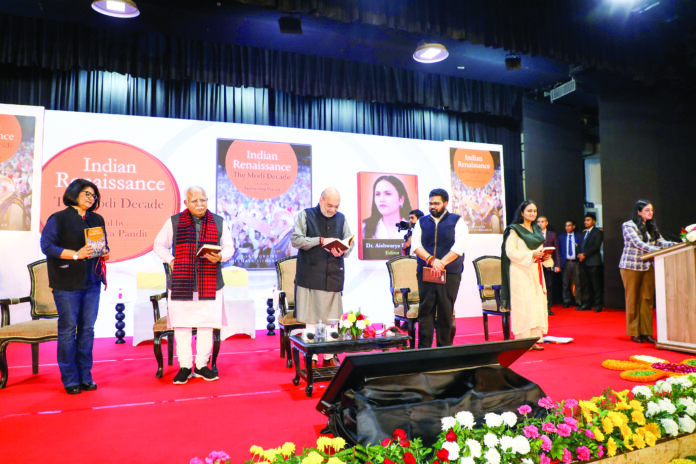 Home Minister Amit Shah launching the book, ‘Indian Renaissance: The Modi Decade’, edited by Dr Aishwarya Pandit, on Thursday. Union Minister for Housing and Urban Affairs Manohar Lal, Rajya Sabha member Kartikeya Sharma and Dr Aishwarya Pandit are also present. Home Minister Amit Shah launching the book, ‘Indian Renaissance: The Modi Decade’, edited by Dr Aishwarya Pandit, on Thursday. Union Minister for Housing and Urban Affairs Manohar Lal, Rajya Sabha member Kartikeya Sharma and Dr Aishwarya Pandit are also present.