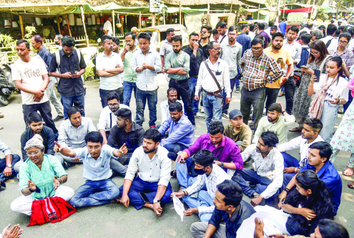 Journalists stage a protest against arrest of journalist Mazumder, in Guwahati on Wednesday. ANI