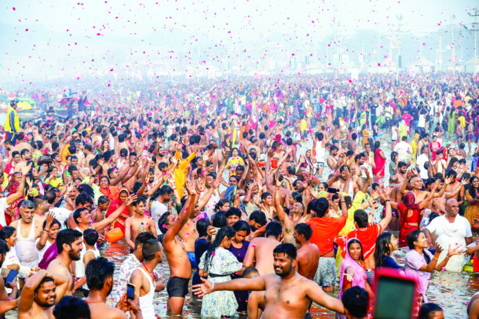 Flower petals being showered on devotees as they take a dip at Triveni Sangam on the occasion of ‘Maha Shivaratri’ during MahaKumbh Mela 2025, in Prayagraj on Wednesday.ANI Flower petals being showered on devotees as they take a dip at Triveni Sangam on the occasion of ‘Maha Shivaratri’ during MahaKumbh Mela 2025, in Prayagraj on Wednesday.ANI