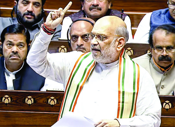 Home Minister Amit Shah speaks in the Rajya Sabha, in New Delhi on Friday. ANI