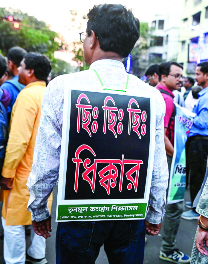 Members of the TMC teacher cell take out a protest rally over the Jadavpur University incident, in Kolkata on Tuesday. Members of the TMC teacher cell take out a protest rally over the Jadavpur University incident, in Kolkata on Tuesday.