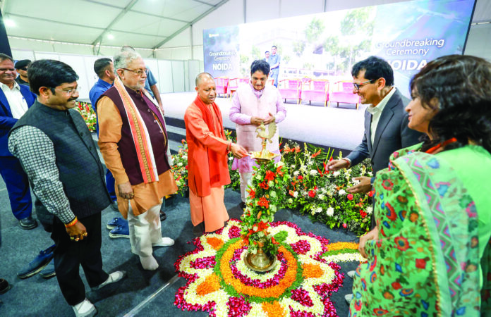 Yogi Adityanath lights a ceremonial lamp during the foundation stone laying ceremony of Microsoft Noida Campus, in Gautam Budh Nagar on Saturday. ANI Yogi Adityanath lights a ceremonial lamp during the foundation stone laying ceremony of Microsoft Noida Campus, in Gautam Budh Nagar on Saturday. ANI