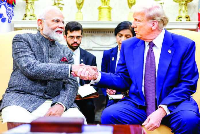 Prime Minister Narendra Modi and U.S. President Donald Trump shake hands, at The White House in Washington, DC on Feb 14. (ANI Photo) Prime Minister Narendra Modi and U.S. President Donald Trump shake hands, at The White House in Washington, DC on Feb 14. (ANI Photo)