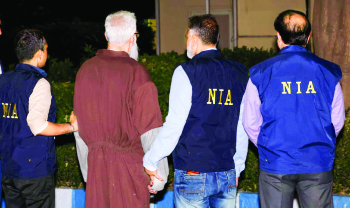 NIA arrests Tahawwur Hussain Rana, the key conspirator in the deadly 26/11 Mumbai terror attacks, immediately after he arrives at IGIA, following his successful extradition from the US, in New Delhi on Thursday. ANI NIA arrests Tahawwur Hussain Rana, the key conspirator in the deadly 26/11 Mumbai terror attacks, immediately after he arrives at IGIA, following his successful extradition from the US, in New Delhi on Thursday. ANI