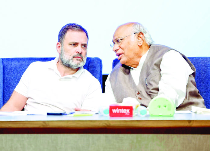 Congress President Kharge in a conversation with LoP in Lok Sabha and Congress MP Rahul Gandhi during the District Congress Committee Presidents’ Meeting, in New Delhi on Friday. ANI Congress President Kharge in a conversation with LoP in Lok Sabha and Congress MP Rahul Gandhi during the District Congress Committee Presidents’ Meeting, in New Delhi on Friday. ANI