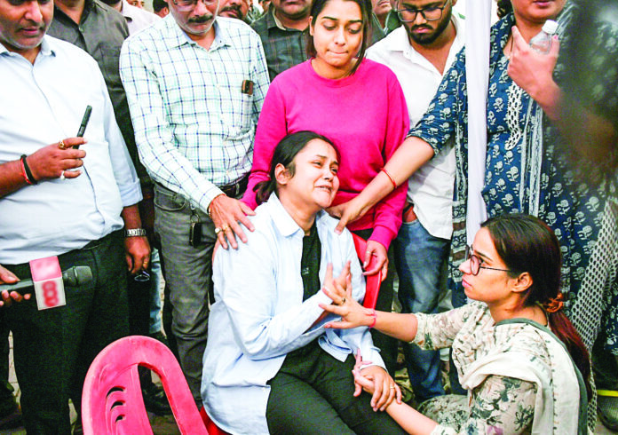 Ashanya Dwivedi, wife of Shubham Dwivedi, who was shot dead in the Pahalgam terror attack, mourns his death, at Hathipur in Kanpur on Thursday. ANI Ashanya Dwivedi, wife of Shubham Dwivedi, who was shot dead in the Pahalgam terror attack, mourns his death, at Hathipur in Kanpur on Thursday. ANI