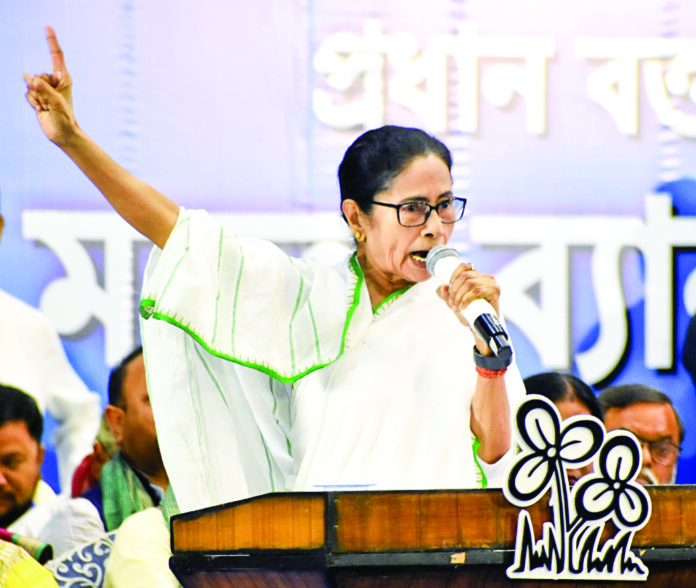 West Bengal CM Mamata Banerjee addresses a gathering during a party workers’ meeting, at Netaji Indoor Stadium in Kolkata on 27 Feb. ANI West Bengal CM Mamata Banerjee addresses a gathering during a party workers’ meeting, at Netaji Indoor Stadium in Kolkata on 27 Feb. ANI