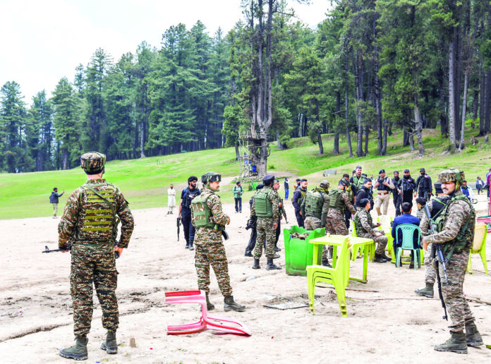 Security personnel inspect the site following the Pahalgam terrorist attack that took place on April 22, leaving several people dead and many injured, at Baisaran in Pahalgam on Wednesday. ANI Security personnel inspect the site following the Pahalgam terrorist attack that took place on April 22, leaving several people dead and many injured, at Baisaran in Pahalgam on Wednesday. ANI