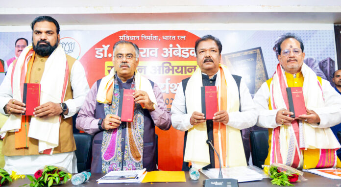 Tarun Chugh, Dilip Jaiswal during a meeting