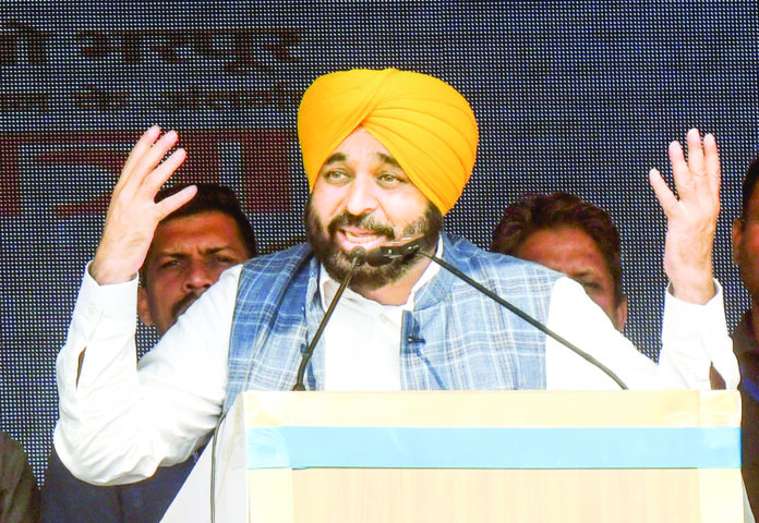 Bhagwant Singh Mann addresses the gathering during the Walk for Drug Free Chandigarh campaign