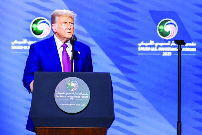 Donald Trump addresses the gathering at the Saudi-US Investment Forum