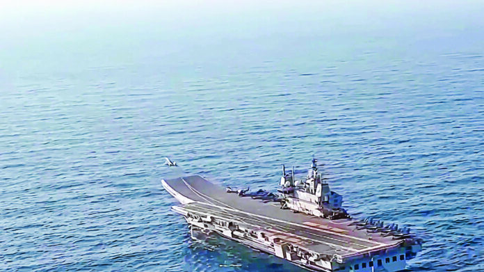 A fighter aircraft seen taking off from INS Vikrant during its deployment in the open waters