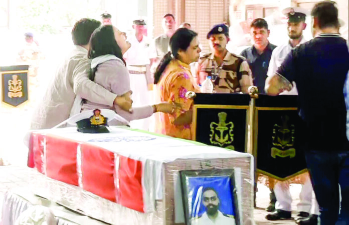 The wife of Indian Navy Lieutenant Vinay Narwal mourns her husband's death in New Delhi. Narwal lost his life in the Pahalgam terror attack on April 22. ANI The wife of Indian Navy Lieutenant Vinay Narwal mourns her husband's death in New Delhi. Narwal lost his life in the Pahalgam terror attack on April 22. ANI