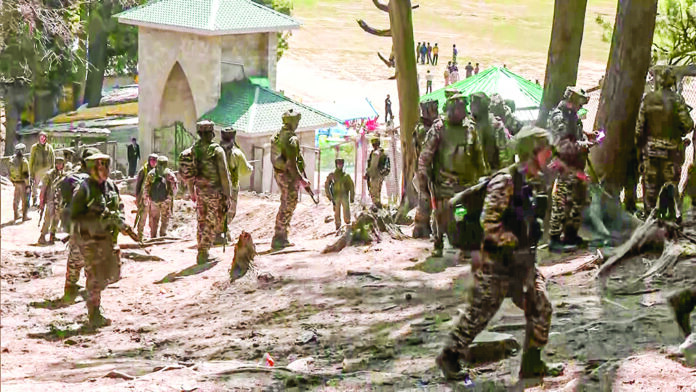 Army personnel arrive at Baisaran meadow, where a terrorist attack took place that left several people dead and many injured, in Pahalgam, on April 22. ANI Army personnel arrive at Baisaran meadow, where a terrorist attack took place that left several people dead and many injured, in Pahalgam, on April 22. ANI