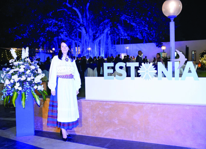 Ambassador Marje Luup wearing the traditional Estonian costume