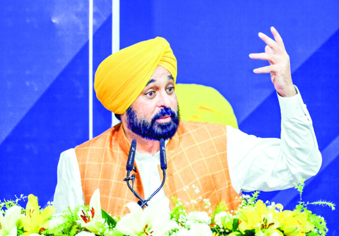 Bhagwant Mann addresses a gathering during 'AAP Sarkaar Aapke Dawar' programme