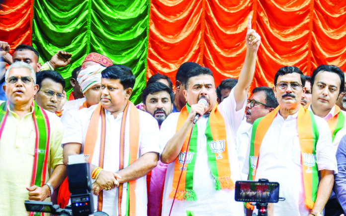 Suvendu Adhikari addresses the gathering during a protest rally